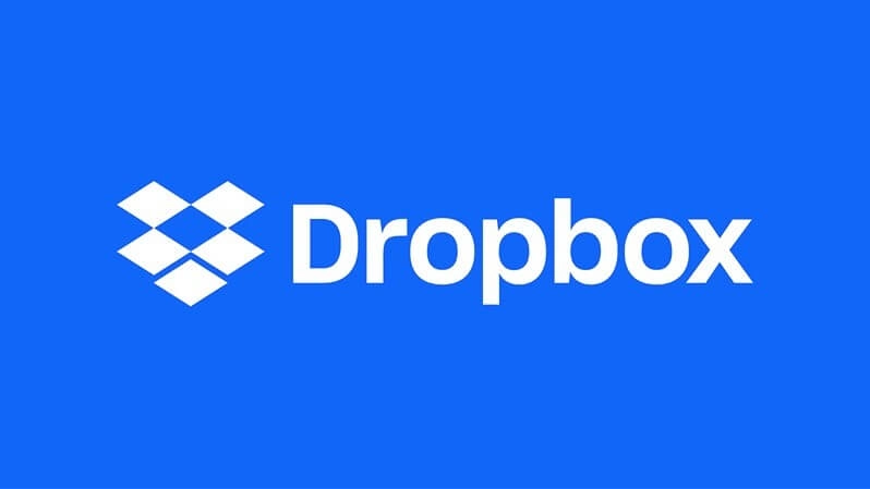 Logo de Dropbox sobre un fondo azul, representando una plataforma de almacenamiento en la nube y colaboración digital.