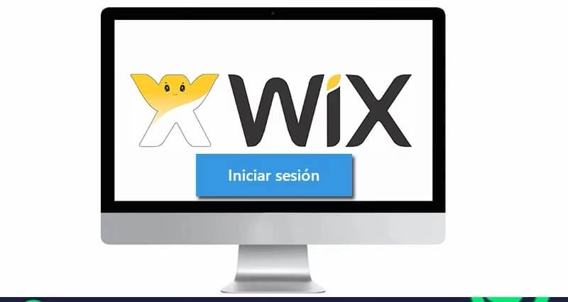 Pantalla de inicio de sesión de Wix en un monitor de computadora, mostrando el logo de Wix y un botón azul con la opción para iniciar sesión.